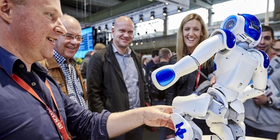 Robot-and-man-at-conference
